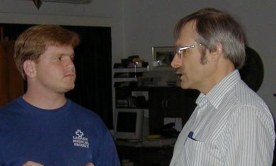 Author (right) in discussion with a colleague